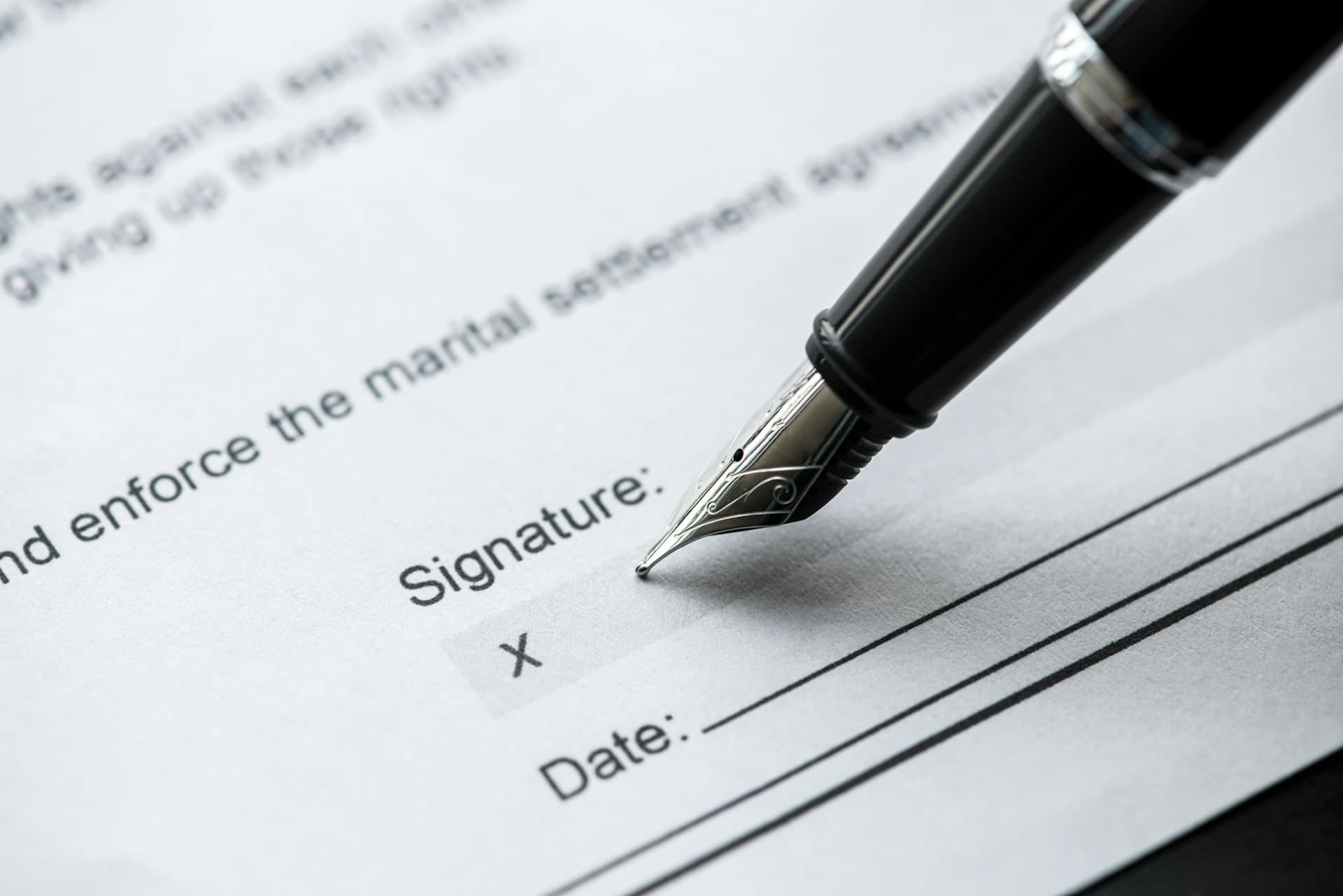 a close-up of a pen on a paper