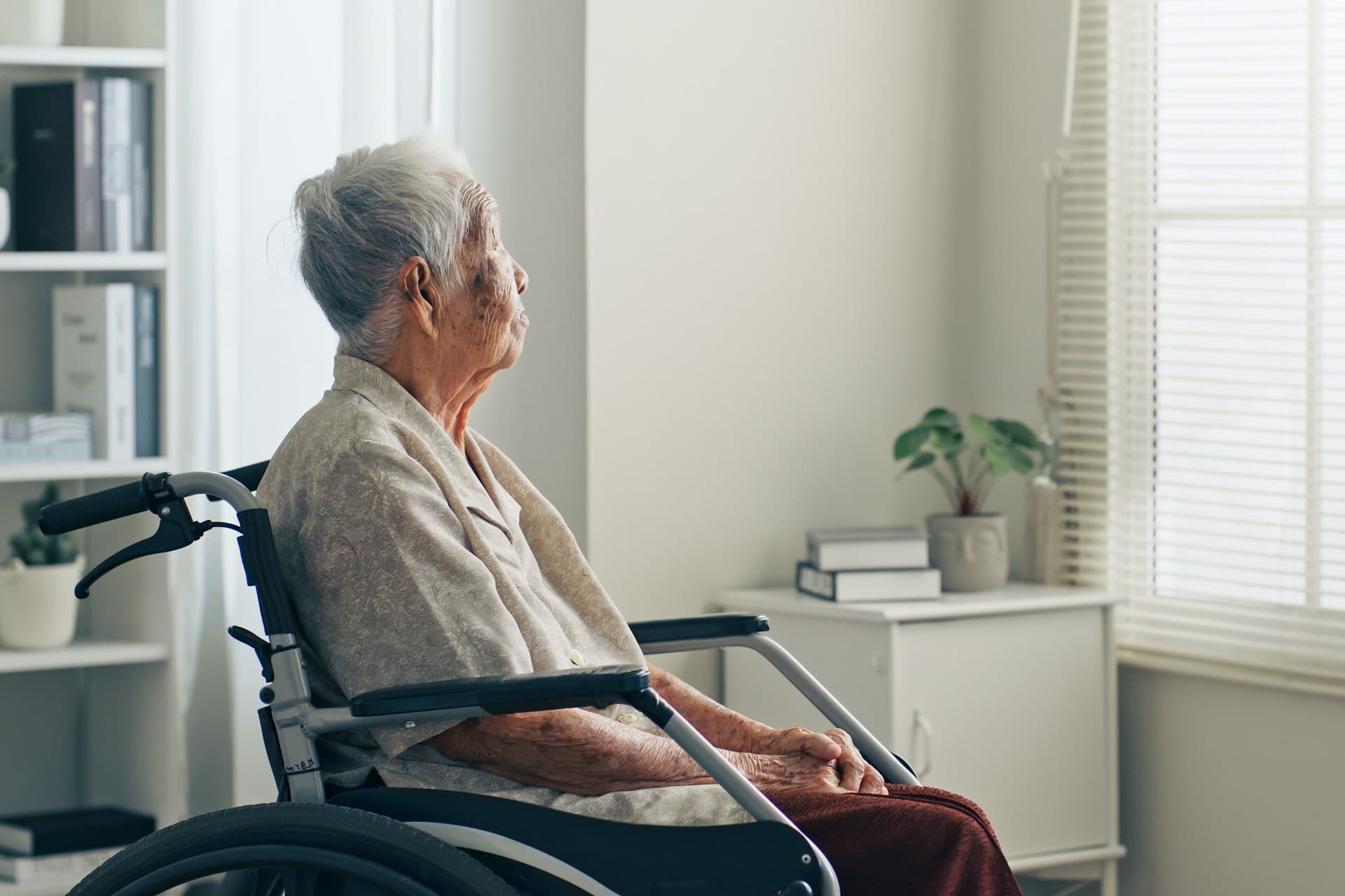an old woman in a wheelchair